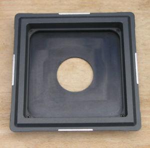 Dvojitá zapuštná destička objektivu M 679,  s hole velikost 1 / Rollei závěrka